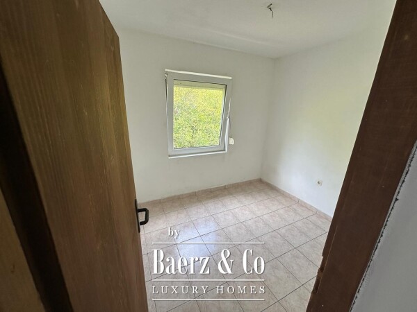 photo 11 House with a Plot in a Premium Location for Renovation